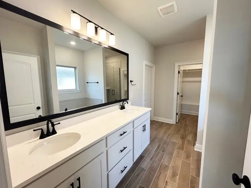 Furnished interior view inside a new home in The Bluffs at Lafayette, Freeport (Image 7).