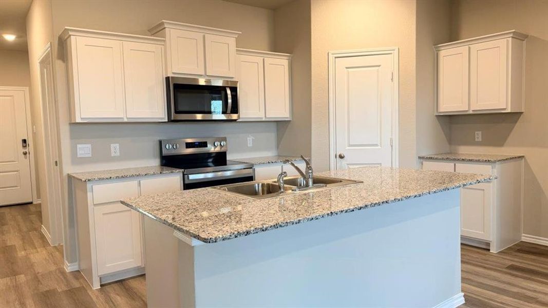 Kitchen - All Home and community information, including pricing, included features, terms, availability and amenities, are subject to change at any time without notice or obligation. All Drawings, pictures, photographs, video, square footages, floor plans, elevations, features, colors and sizes are approximate for illustration purposes only and will vary from the homes as built.