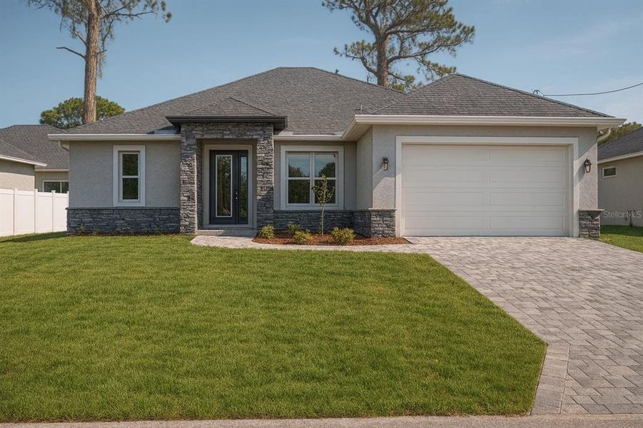 Front exterior of a new home in , North Port, FL, highlighting curb appeal (Image 1). Front exterior of a new home in , North Port, FL, highlighting curb appeal (Image 1).