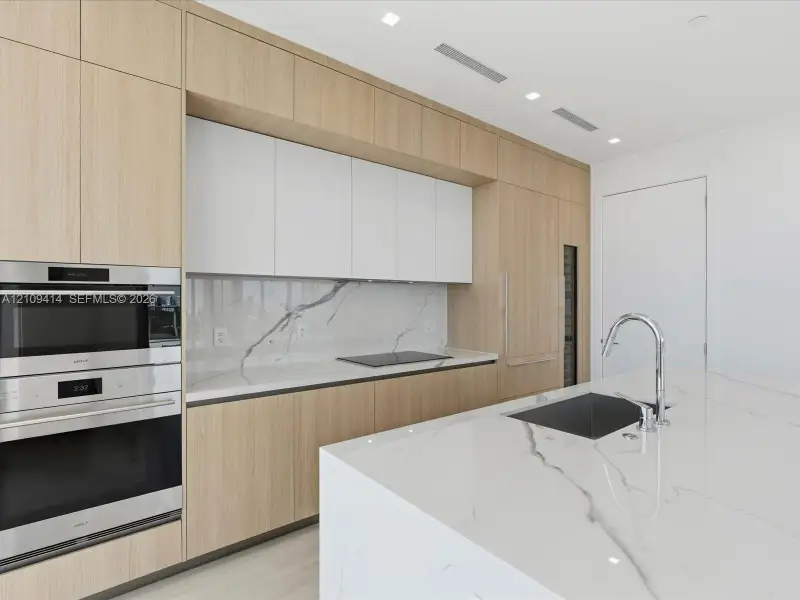 Furnished interior view inside a new home in , North Miami (Image 5).