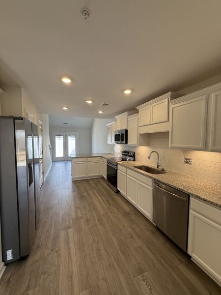 Furnished interior view inside a new home in Legacy Fields, Pleasant View (Image 5).