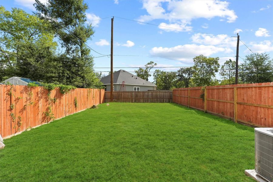 Exterior details and patio area of a home in , Houston (Image 3).