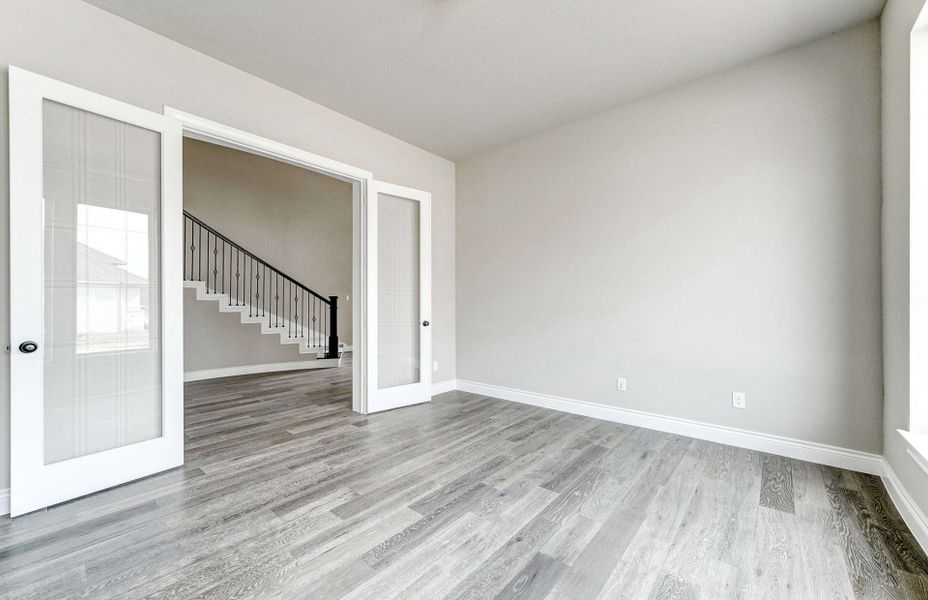 Spacious, unfurnished interior of a new home in Bridgeland 60′, Cypress (Image 19).