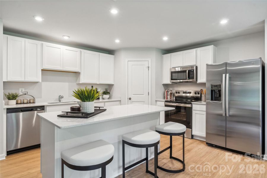 Example Photo Example Photo