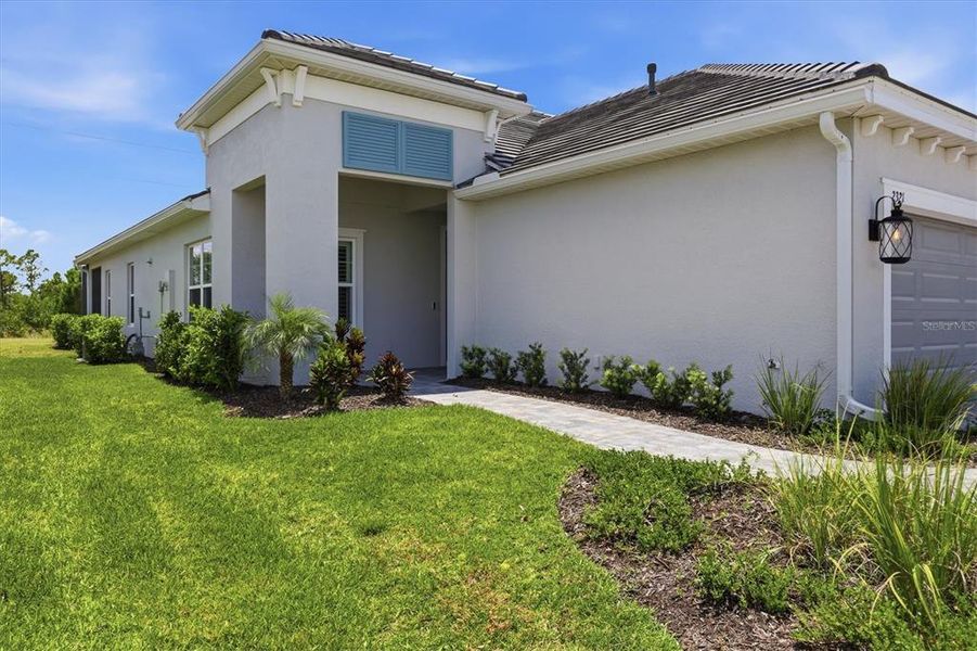 Exterior details and patio area of a home in Windward, Lakewood Ranch (Image 3). Exterior details and patio area of a home in Windward, Lakewood Ranch (Image 3).