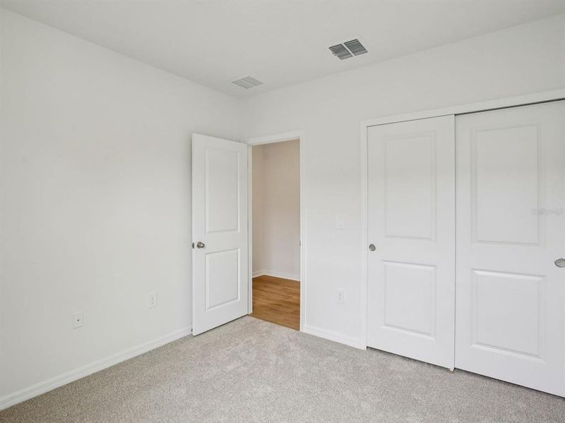 Spacious, unfurnished interior of a new home in Coasterra - Premier Series, Palmetto (Image 21). Spacious, unfurnished interior of a new home in Coasterra - Premier Series, Palmetto (Image 21).