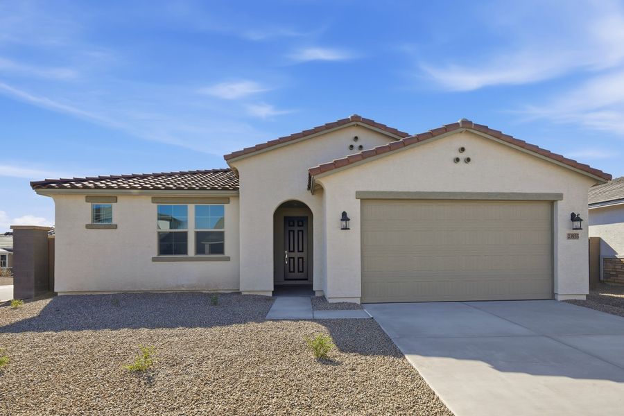 Front exterior of a new home in Montana Vista - Summit, Buckeye, AZ, highlighting curb appeal (Image 1). Front exterior of a new home in Montana Vista - Summit, Buckeye, AZ, highlighting curb appeal (Image 1).