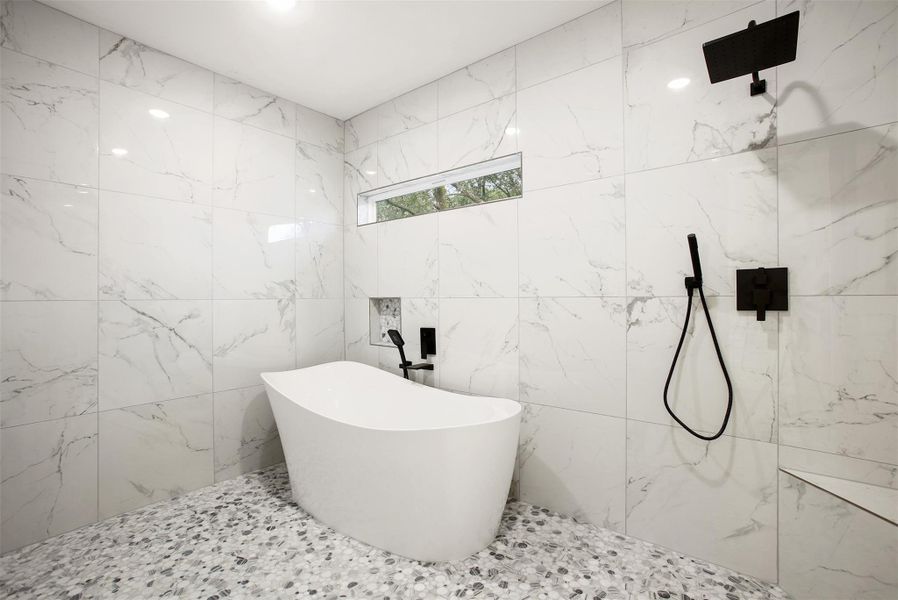 Oversized shower room with a standalone tub