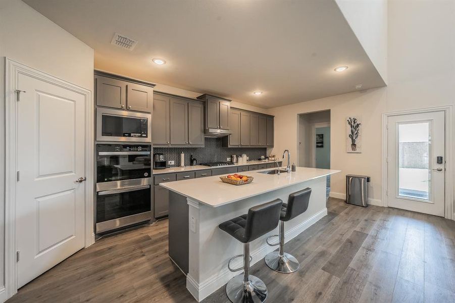 Furnished interior view inside a new home in , Little Elm (Image 12).