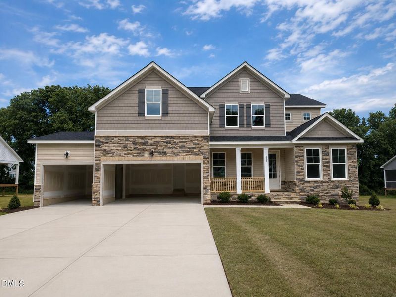 Front exterior of a new home in Tobacco Road, Angier, NC, highlighting curb appeal (Image 2).