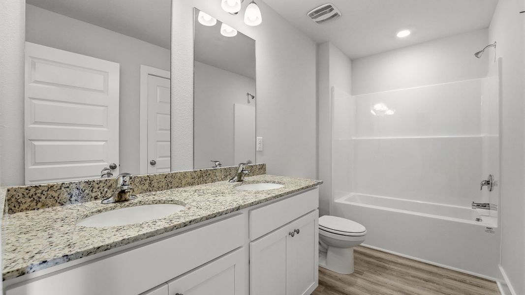 Furnished interior view inside a new home in Chateau Nemours, Port Saint Joe (Image 14).