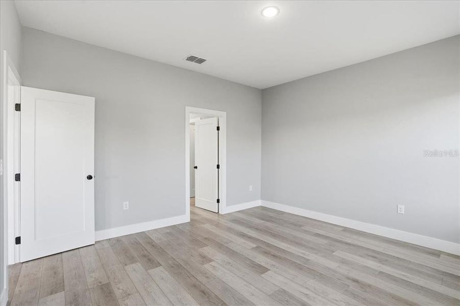 Spacious, unfurnished interior of a new home in , Port Charlotte (Image 32).