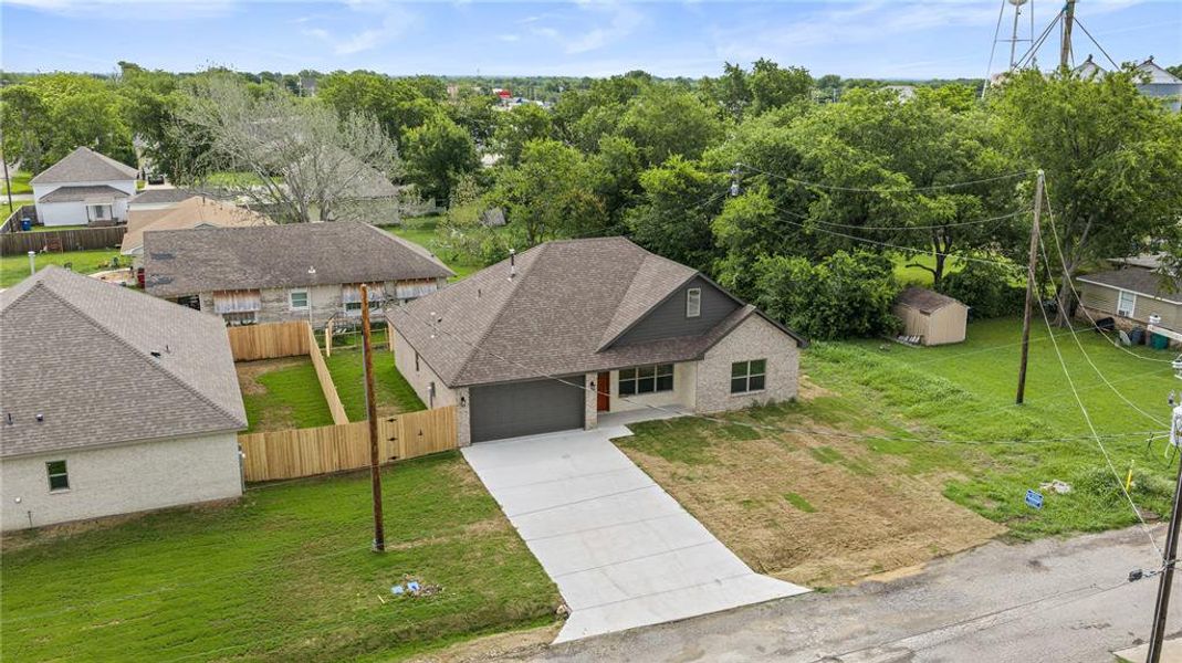 Front exterior of a new home in , Tom Bean, TX, highlighting curb appeal (Image 20).