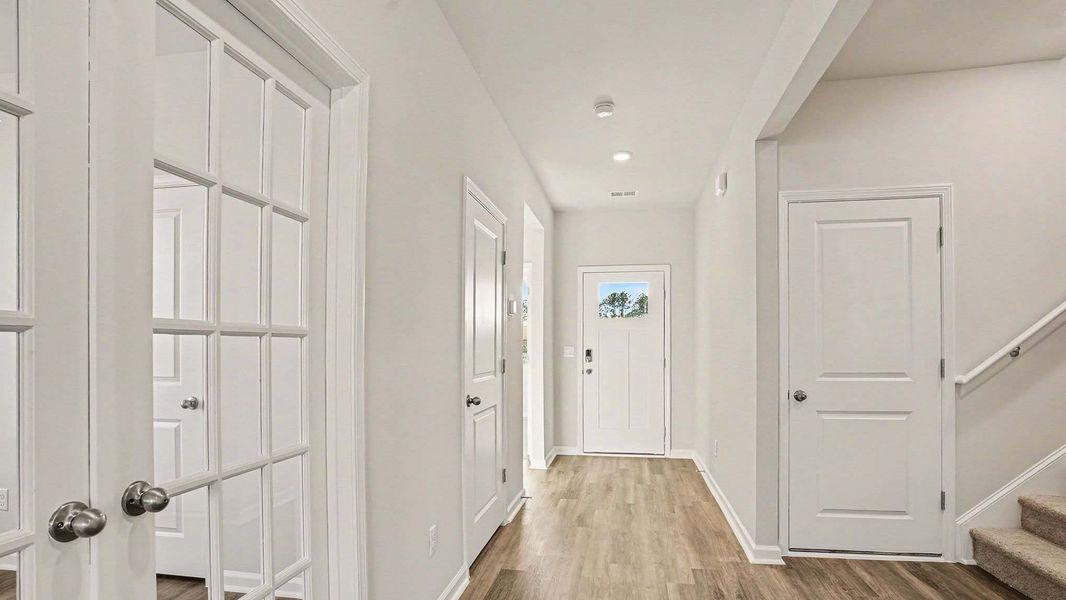 Representative unfurnished interior of a home built from the Bristol by D.R. Horton in Fox Run, Supply (Image 7).