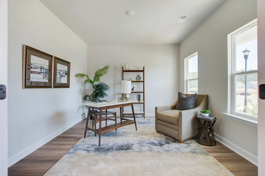Representative furnished interior of a home built from the Harrison by Ashton Woods in Watson Hill, Summerville (Image 14).