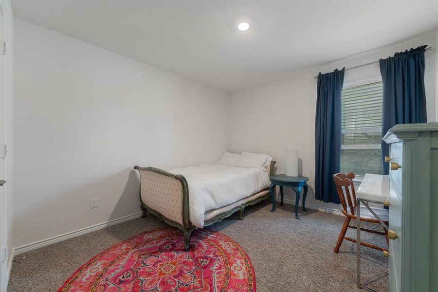 Bedroom with carpet floors, recessed lighting, and baseboards