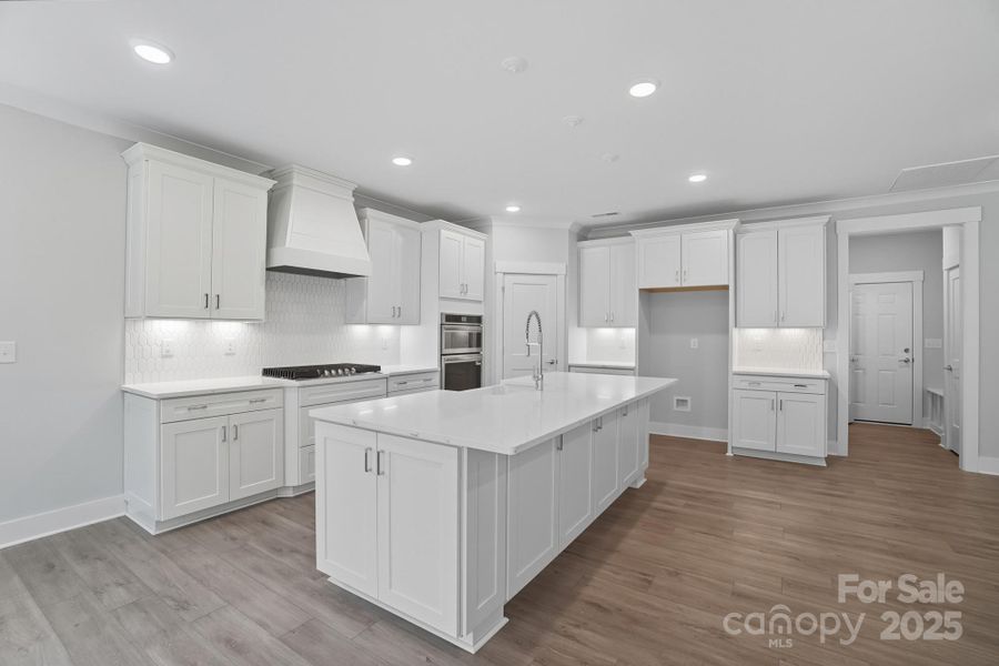 Furnished interior view inside a new home in Heritage - 55+ Community, Indian Trail (Image 9). Furnished interior view inside a new home in Heritage - 55+ Community, Indian Trail (Image 9).