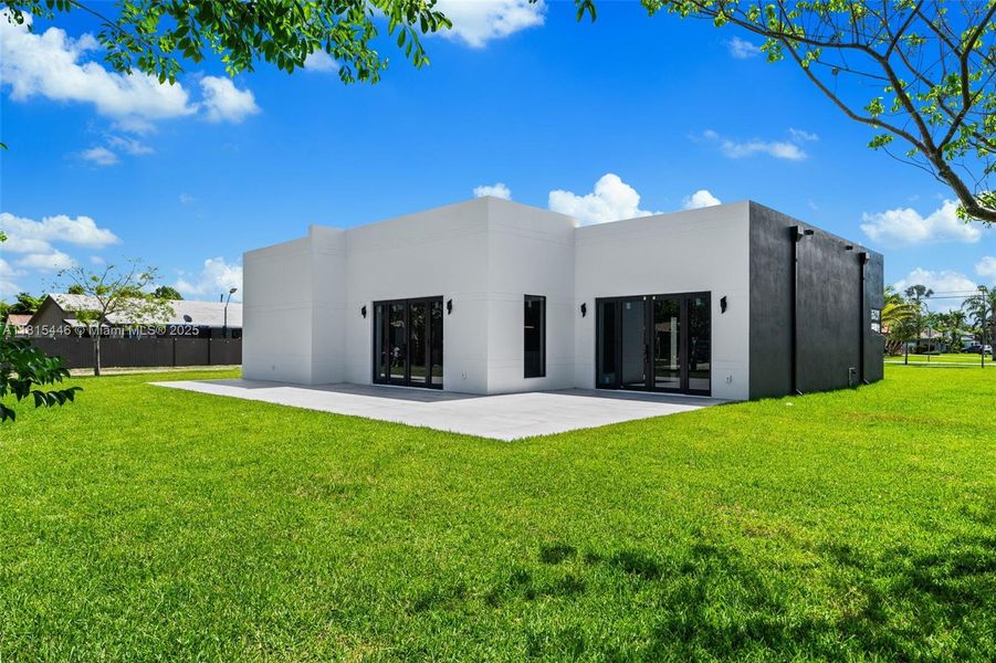 Front exterior of a new home in , Homestead, FL, highlighting curb appeal (Image 22).