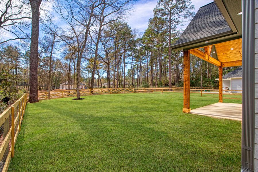 Spacious fully fenced backyard and wonderful covered patio to enjoy your outdoor adventures. Spacious fully fenced backyard and wonderful covered patio to enjoy your outdoor adventures.