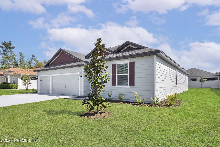 Front exterior of a new home in , Jacksonville, FL, highlighting curb appeal (Image 14). Front exterior of a new home in , Jacksonville, FL, highlighting curb appeal (Image 14).