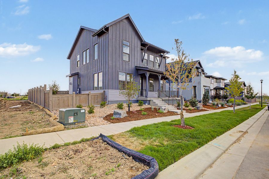 Front exterior of a new home in West Grange, Longmont, CO, highlighting curb appeal (Image 2). Front exterior of a new home in West Grange, Longmont, CO, highlighting curb appeal (Image 2).