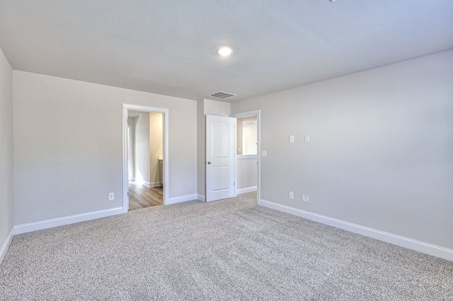 The primary suite offers a private retreat.