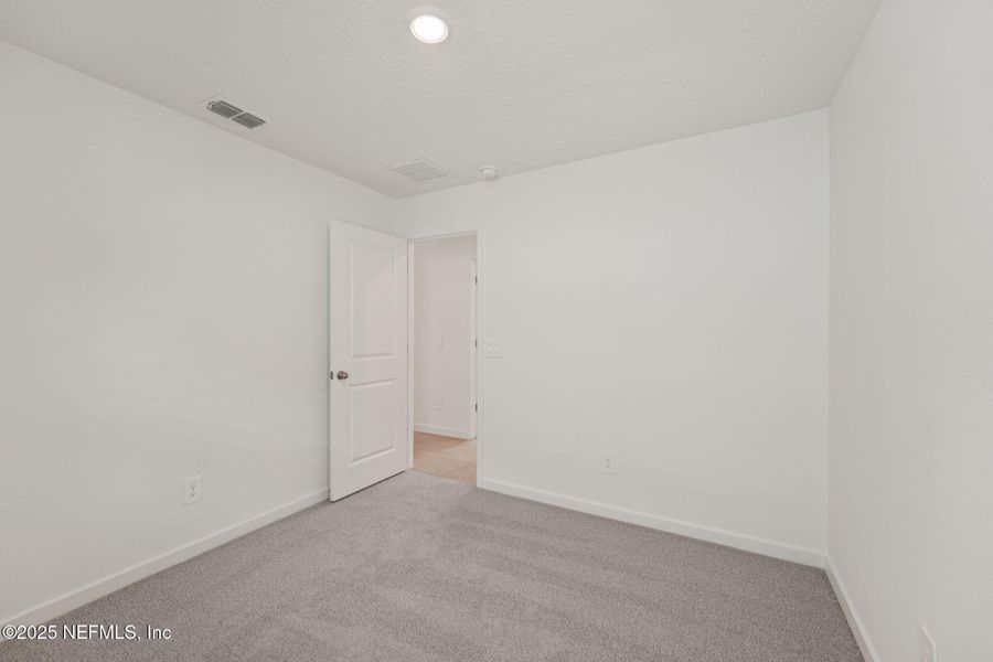 Spacious, unfurnished interior of a new home in Flagler Village - Classic Series, Palm Coast (Image 39). Spacious, unfurnished interior of a new home in Flagler Village - Classic Series, Palm Coast (Image 39).