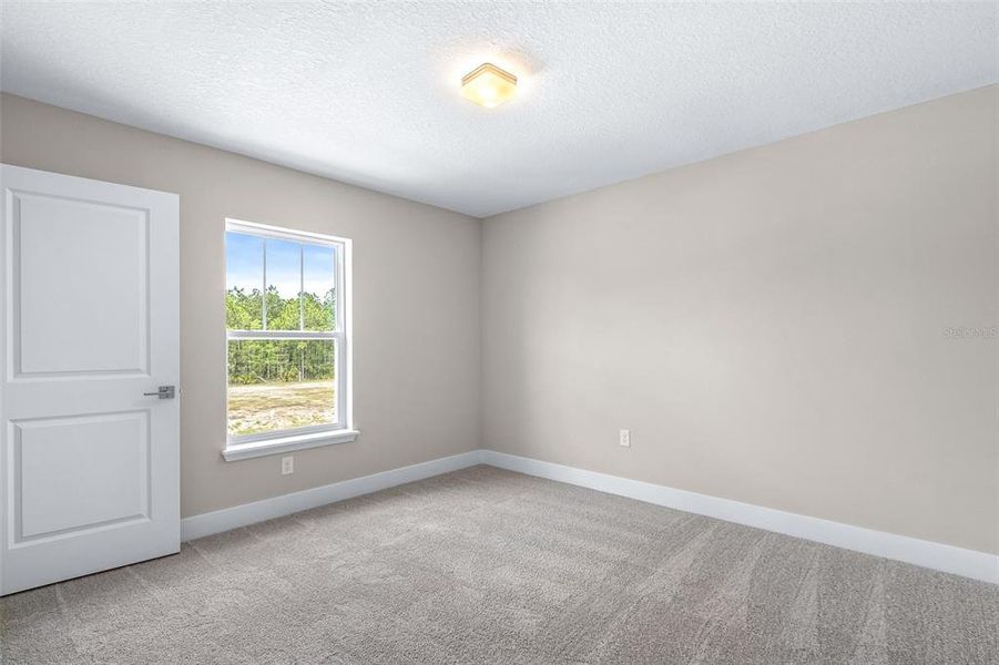 Spacious, unfurnished interior of a new home in Gray Hawk at Hole Two, Daytona Beach (Image 20). Spacious, unfurnished interior of a new home in Gray Hawk at Hole Two, Daytona Beach (Image 20).