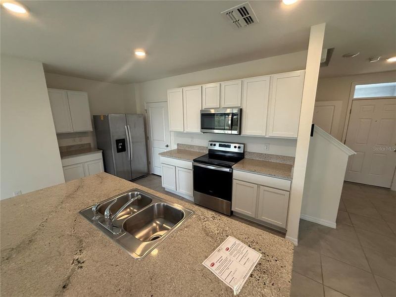 Furnished interior view inside a new home in Westgate at Avalon Park, Wesley Chapel (Image 4).