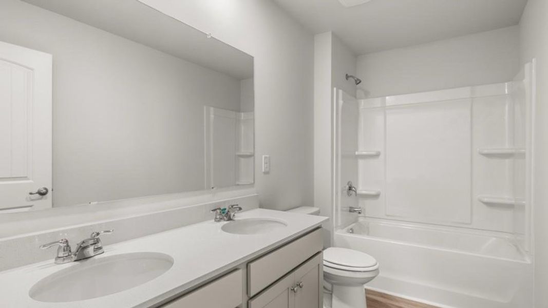 Furnished interior view inside a new home in Fairway 17 at Mirror Lake, Villa Rica (Image 3). Furnished interior view inside a new home in Fairway 17 at Mirror Lake, Villa Rica (Image 3).