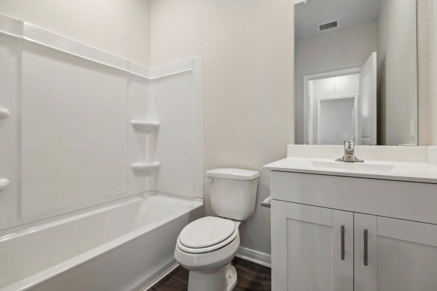 Furnished interior view inside a new home in Sweetwater Ridge, Conroe (Image 5).