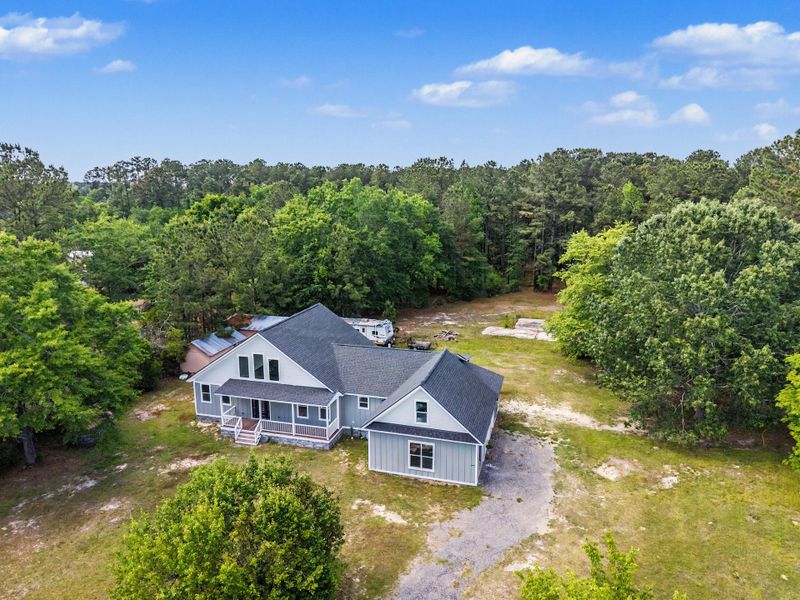 Front exterior of a new home in , Moncks Corner, SC, highlighting curb appeal (Image 23).