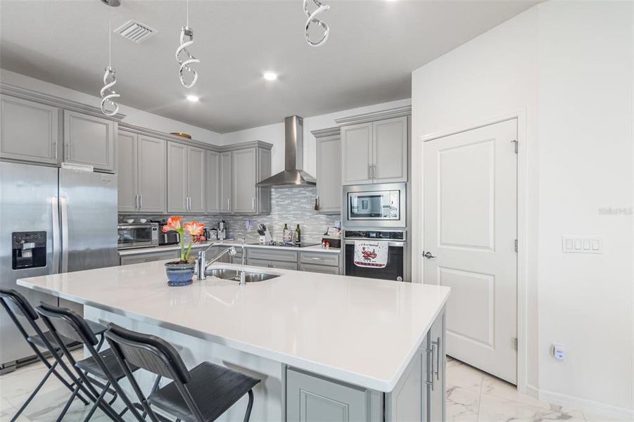 Furnished interior view inside a new home in Tohoqua Reserve, Kissimmee (Image 11).