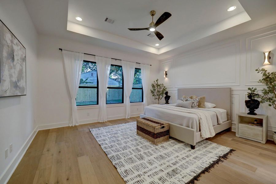 Downstairs primary suite is a retreat*photos are of a previously constructed home by the builder. 1527 Hewitt may have different selections at builders sole discretion. These photos are not meant to be an exact representation of 1527 Hewitt.