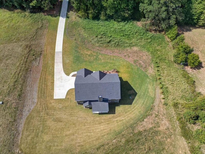 Front exterior of a new home in Blackwelder Bluff, Bowdon, GA, highlighting curb appeal (Image 31).