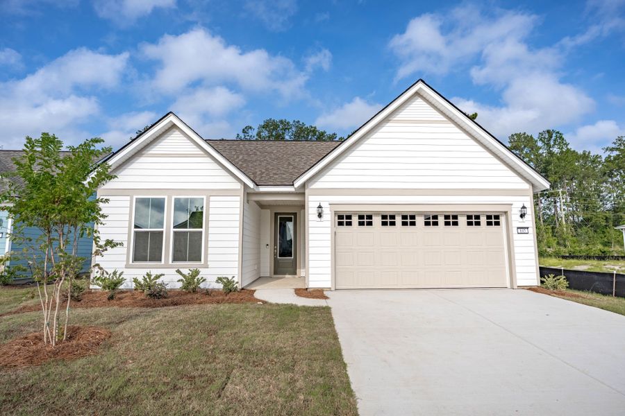 Front exterior of a new home in Del Webb Charleston at Nexton, Summerville, SC, highlighting curb appeal (Image 23). Front exterior of a new home in Del Webb Charleston at Nexton, Summerville, SC, highlighting curb appeal (Image 23).
