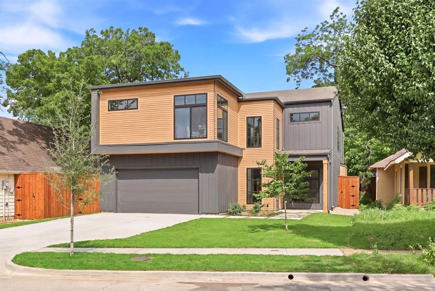 Front exterior of a new home in , Dallas, TX, highlighting curb appeal (Image 23).