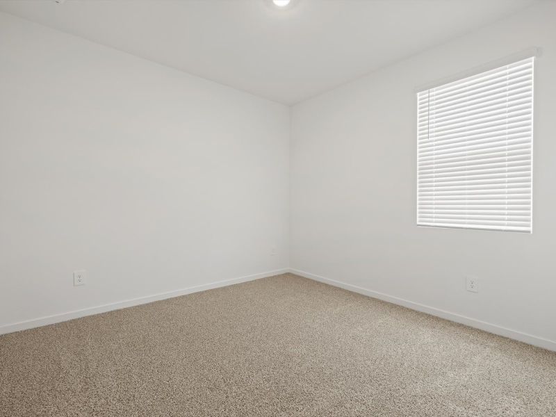 Spacious, unfurnished interior of a new home in Rancho Mirage Estate Series, Maricopa (Image 13).