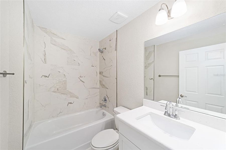 Furnished interior view inside a new home in , Dunnellon (Image 10).