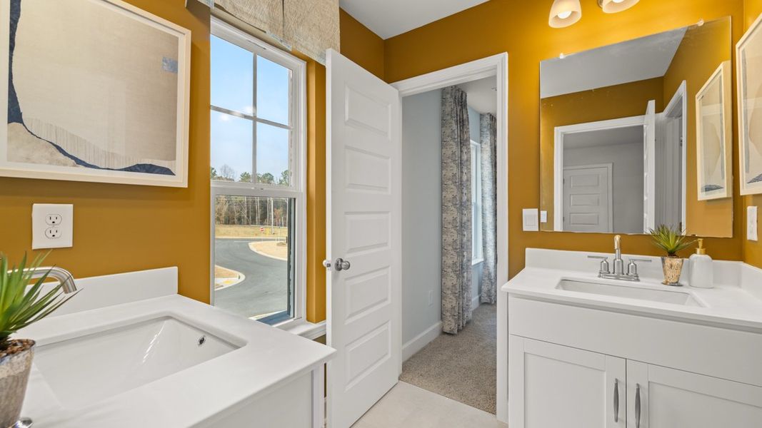 Representative furnished interior of a home built from the Savannah by D.R. Horton in Evergreen Crossing, Locust Grove (Image 37).