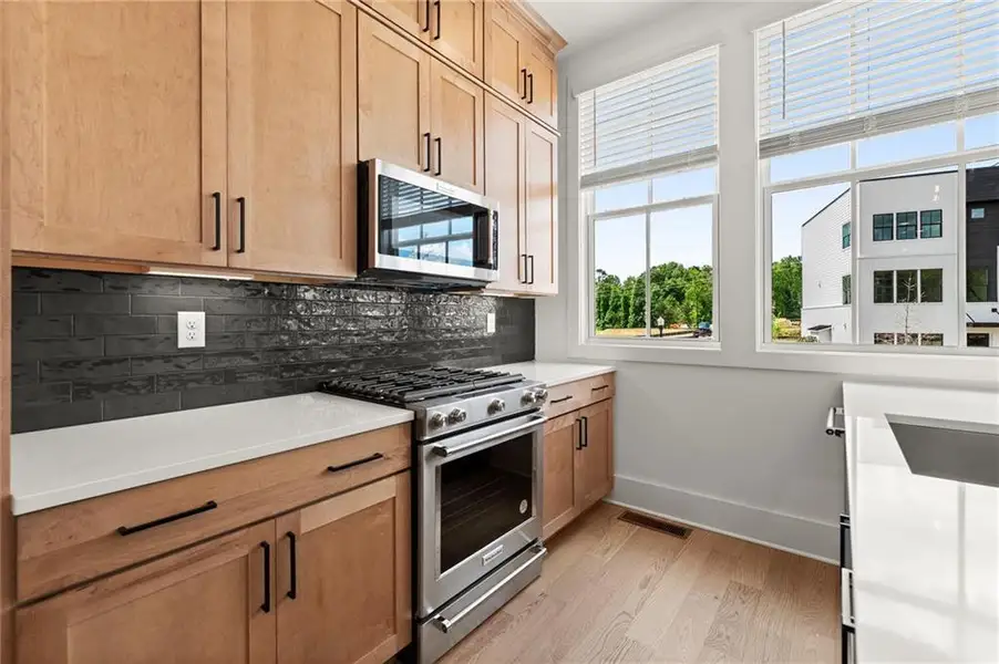 Furnished interior view inside a new home in The Gathering – Alpharetta, Alpharetta (Image 9). Furnished interior view inside a new home in The Gathering – Alpharetta, Alpharetta (Image 9).