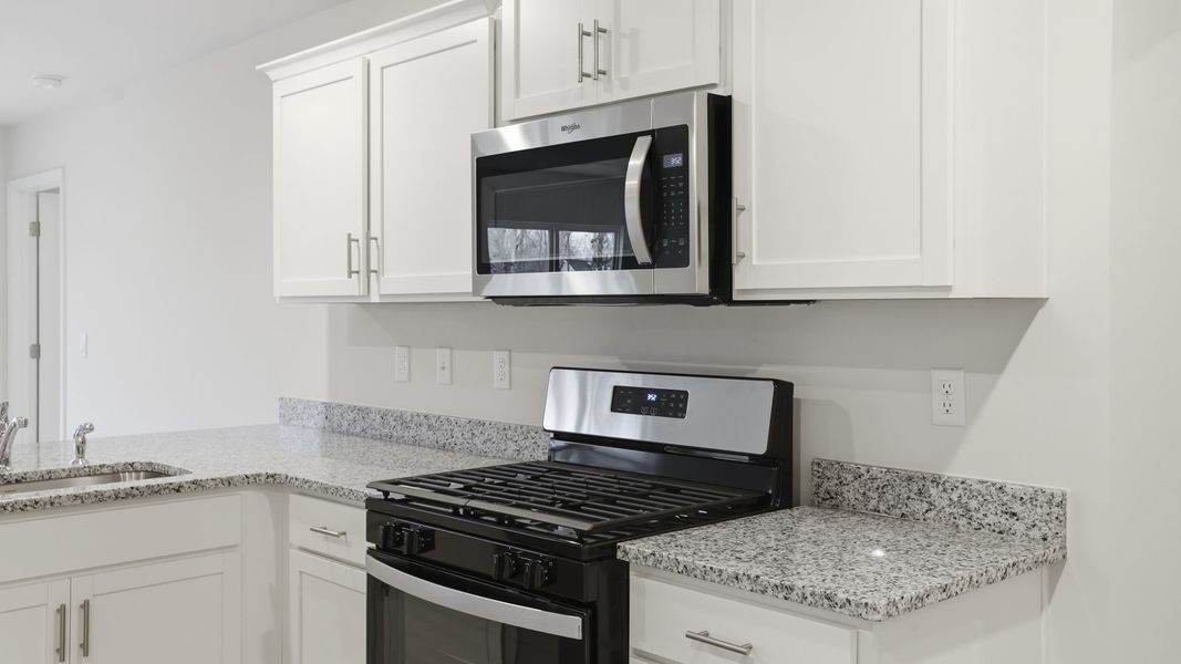Furnished interior view inside a new home in Bentley Park, Greenwood (Image 10).
