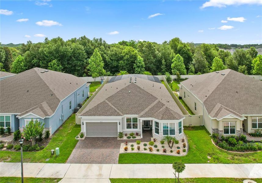 Front exterior of a new home in Winding Meadows, Apopka, FL, highlighting curb appeal (Image 24).