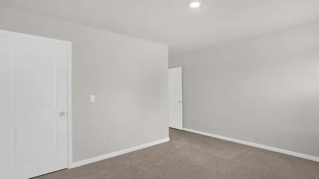 Spacious, unfurnished interior of a new home in The Estates Park, Apex (Image 31).