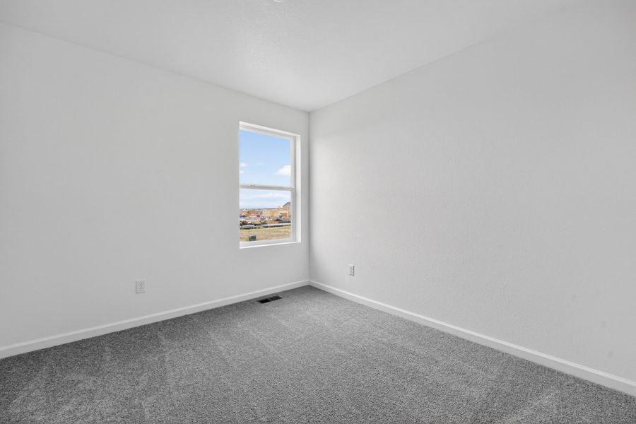 Spacious, unfurnished interior of a new home in Sky Ranch, Watkins (Image 14).