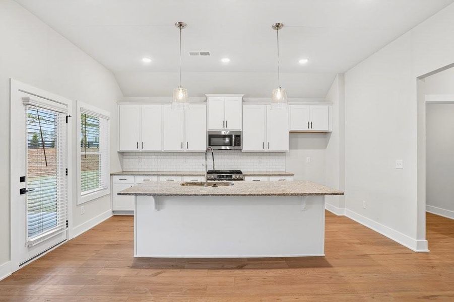 Furnished interior view inside a new home in The Fairways at Mirror Lake, Villa Rica (Image 7).