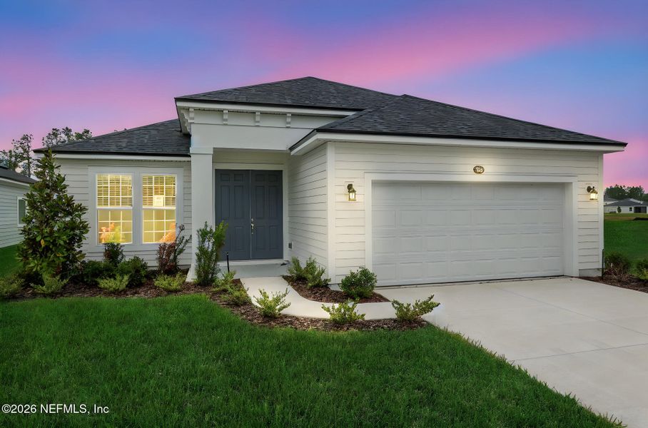 Front exterior of a new home in Amberly, Green Cove Springs, FL, highlighting curb appeal (Image 1). Front exterior of a new home in Amberly, Green Cove Springs, FL, highlighting curb appeal (Image 1).