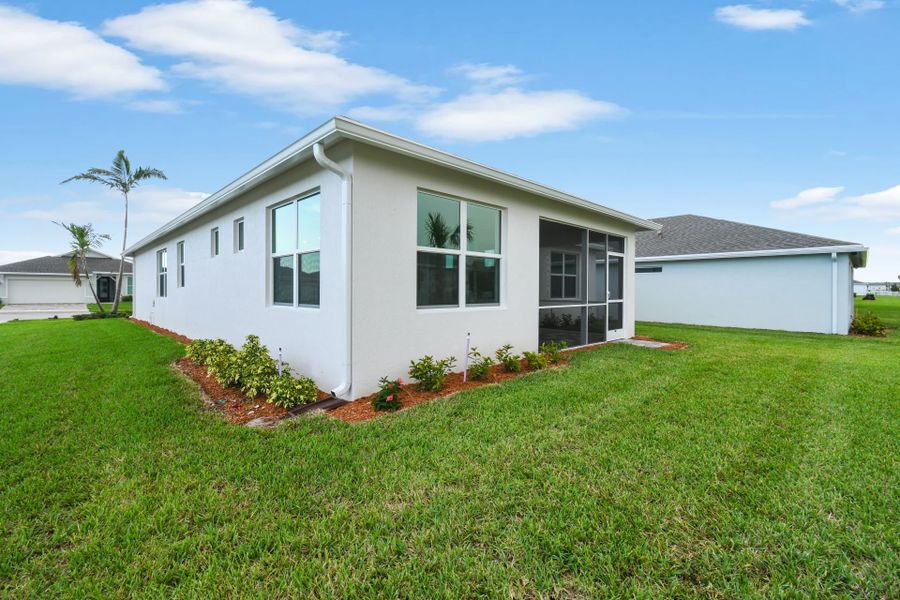 Exterior details and patio area of a home in Del Webb Tradition, Port St. Lucie (Image 22).