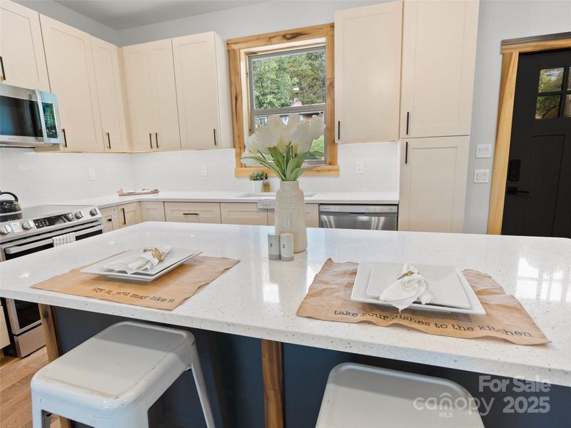 Furnished interior view inside a new home in , Waynesville (Image 8).