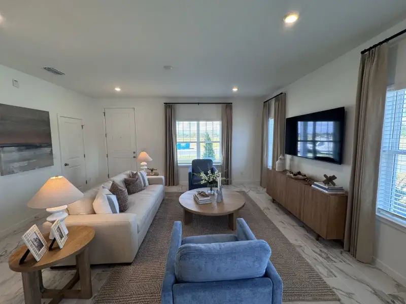 Furnished interior view inside a new home in Whaley Grove Townhomes, St. Cloud (Image 7). Furnished interior view inside a new home in Whaley Grove Townhomes, St. Cloud (Image 7).